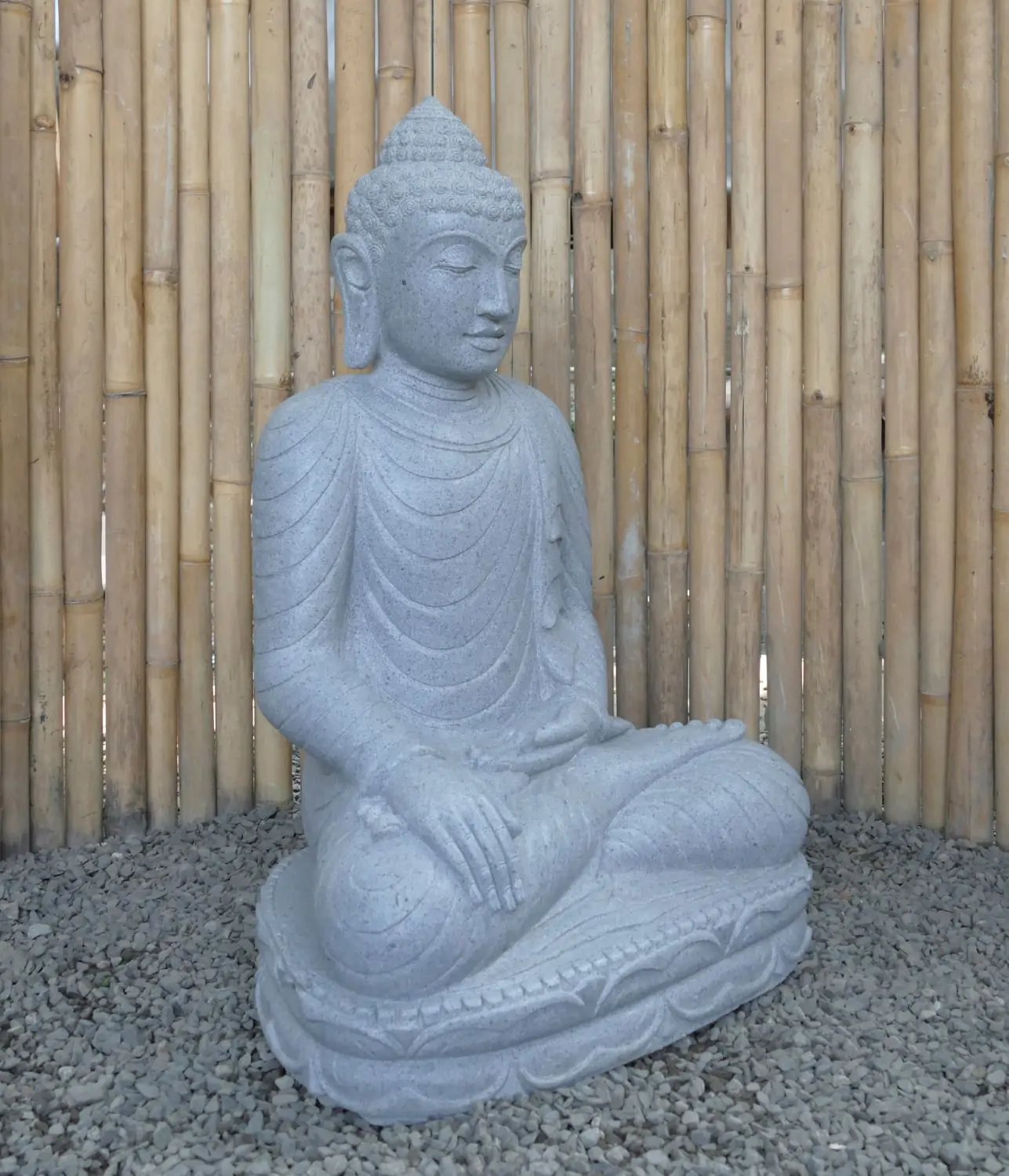  Product image 2 of the product “Seated Buddha made of Riverstone in Bhumisparsha - gesture of touching the earth. 80cm height. ”